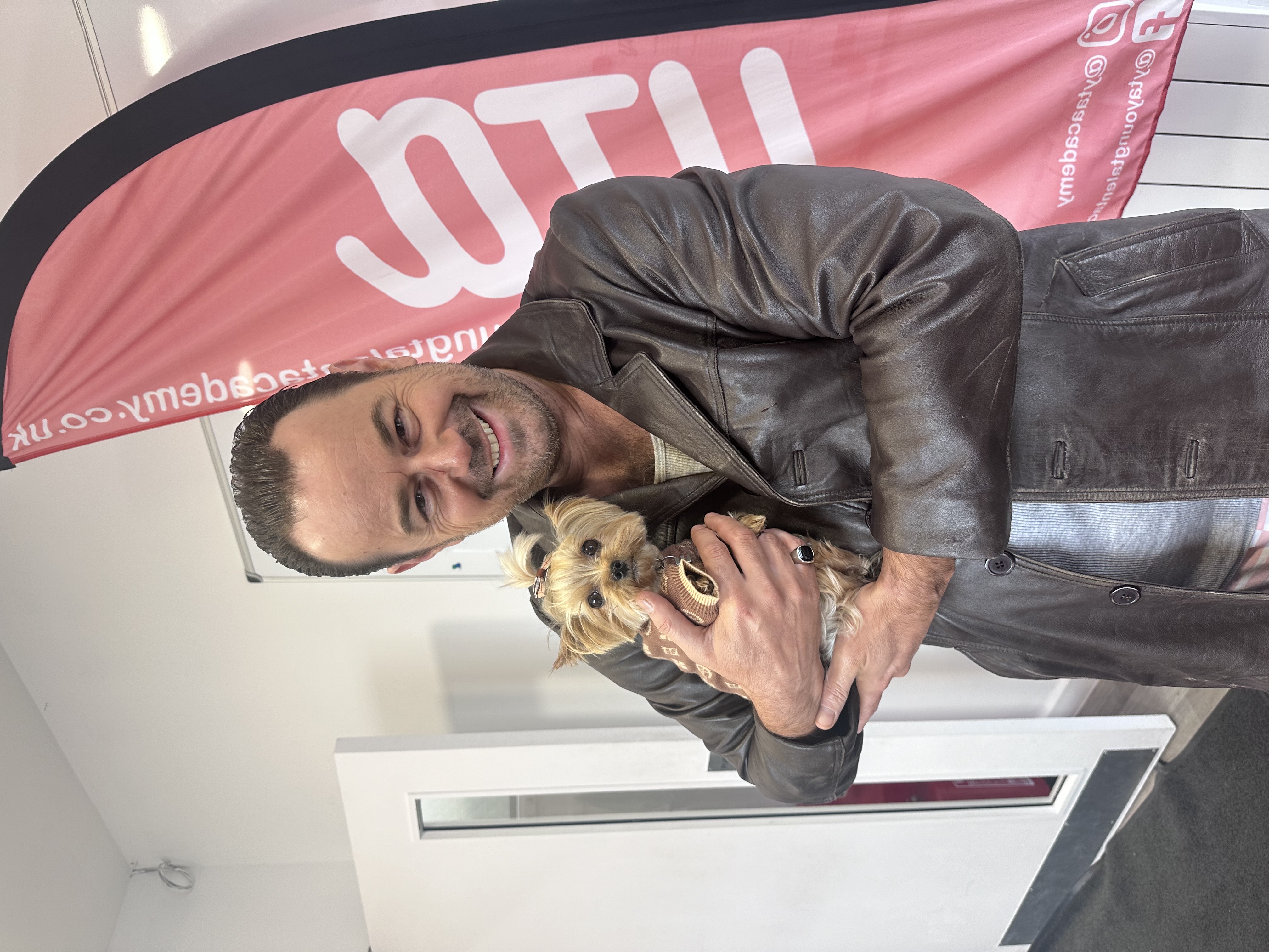 Esme being held by Danny Dyer